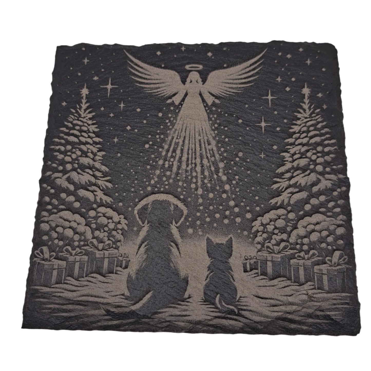 A beautifully etched slate coaster featuring a Christmas scene