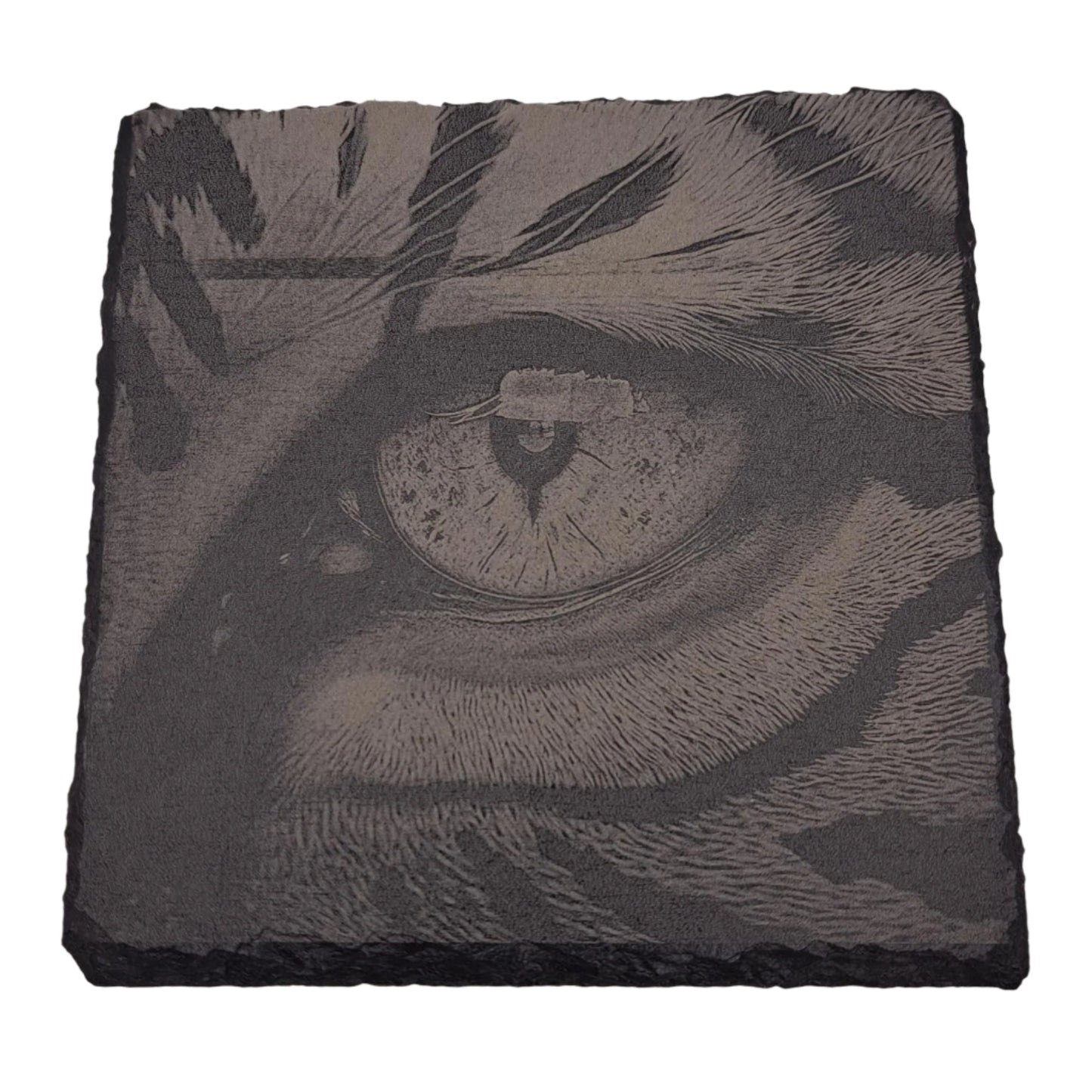 A beautifully etched slate coaster featuring a tigers eye