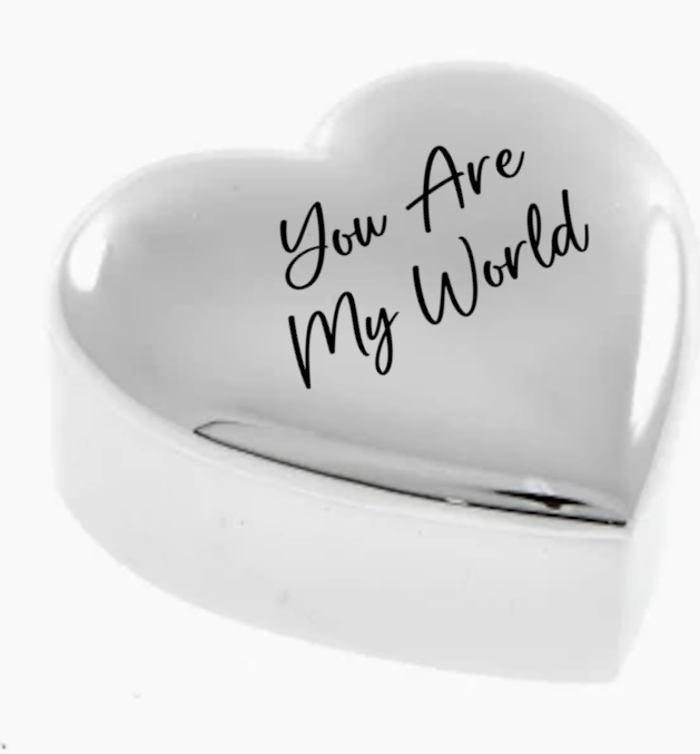 Heart-shaped object with 'You Are My World' text on a white background